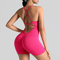 Pink swimsuit with open back on a gray background