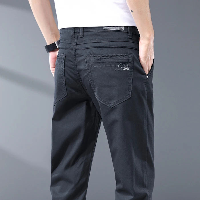 The Spectrum Slim — Seven-Color Stretch Jean